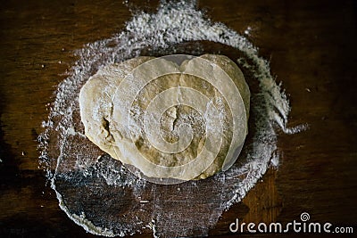 Dough with flour on the boards Stock Photo