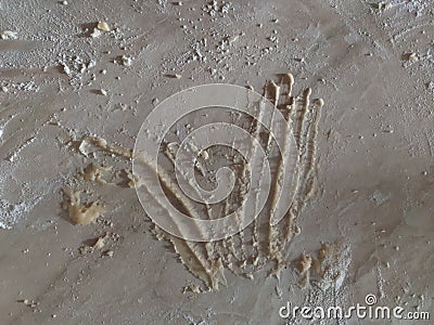 Dough hand marks. Flour on a marble table. Dough and flour on the table. Cooking. Bakery. Baking at home. Stock Photo