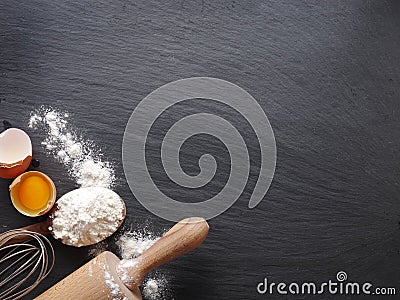 Dough preparation. Baking ingredients: egg and flour. Stock Photo