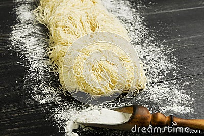 Dough thin threads for cooking Stock Photo