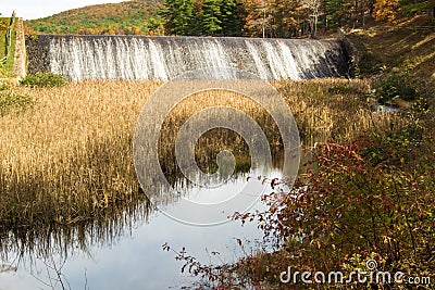 Douthat Lake Upper Dam and Spillway Stock Photo