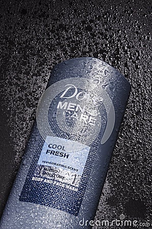 Dove body and face wash isolated on stone slate background. Dove is personal care brand owned by Unilever originating in UK Editorial Stock Photo