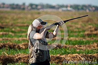 Dove Hunter takes aim Stock Photo