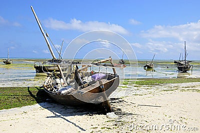 dow sits at Nungwi Stock Photo