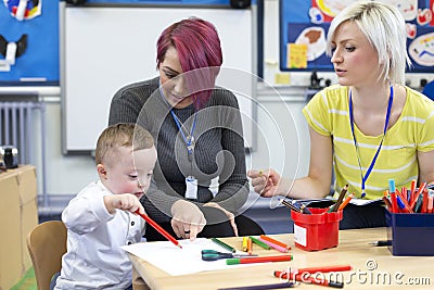 Down Syndrome boy at Nursery Stock Photo