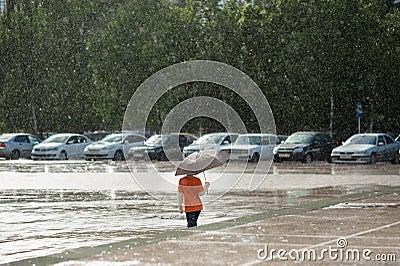 Downfall, rain, weather, natural disaster, rain, child , umbrella, boy, kid Stock Photo