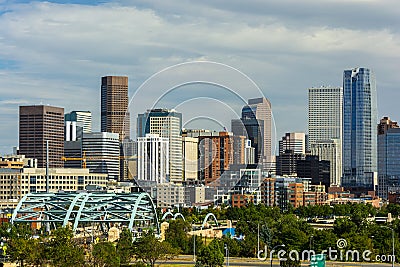Downtown Denver, Colorado Skyscrapers with Confluence Park and the Speer Blvd. Platte River Bridges in the Foreground Stock Photo