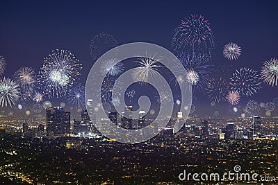 Downtown Los Angeles city scape with flashing fireworks on new years Stock Photo