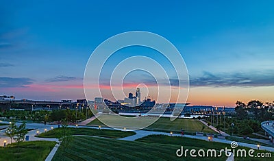 Downtown Omaha at dusk as the sun sets as seen from Council Bluff Stock Photo