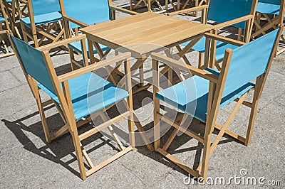 Downtown restaurant terrace with folding canvas chairs Stock Photo