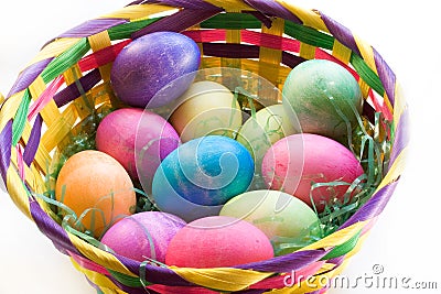 A Dozen Easter Eggs in an Easter Basket Stock Photo