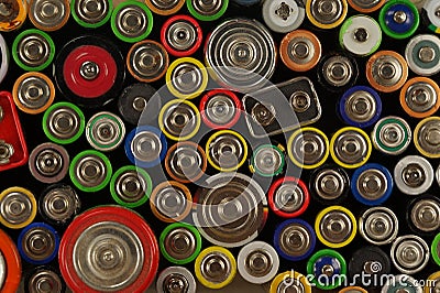 Dozens of types, sizes, colors of used batteries and accumulators. Preparations for recycling or utilization Stock Photo