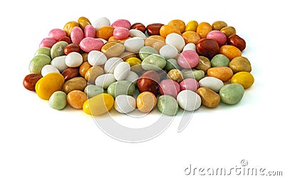 Dragees candy multicolored sea pebbles on a white background Stock Photo