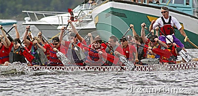 Dragon boat red team races Editorial Stock Photo