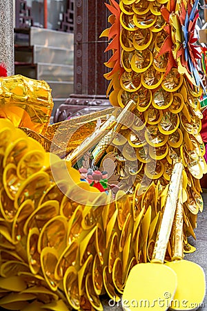 Dragon boat tied with golden paper, characteristic of Guangxi Zhuang, a Chinese minority Stock Photo