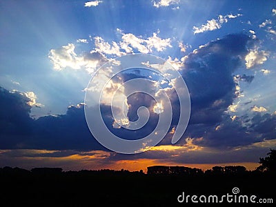 Dragon breathing fire from the clouds Stock Photo