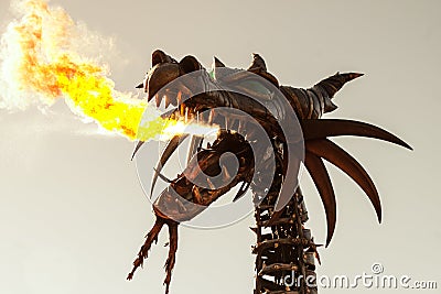 Dragon breathing fire in Disney World Editorial Stock Photo