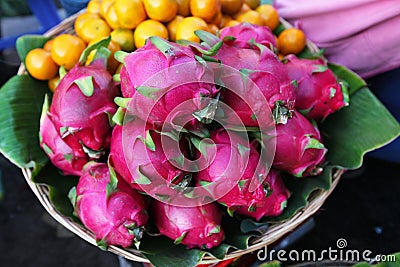 Dragon fruit or pitaya in the basket on fruit mark Stock Photo