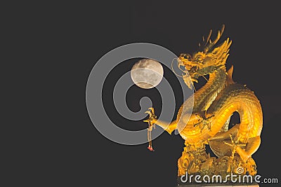 Dragon and moon Stock Photo