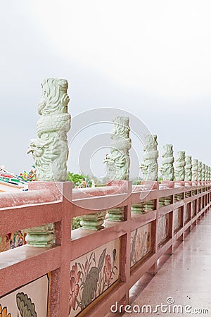 Dragon pillar at the corridor of Chinese Temple Stock Photo