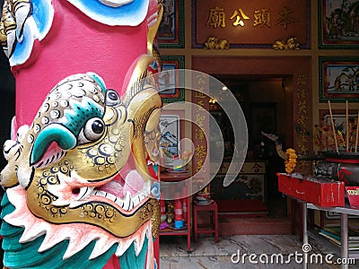 Dragon pole at Chinese shrine Editorial Stock Photo