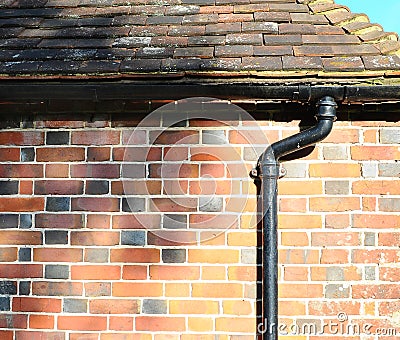 Drain pipe, tiles and bricks Stock Photo