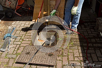 Drain unblocking. Stock Photo