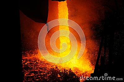 Drained hot liquid metal from the furnace Stock Photo