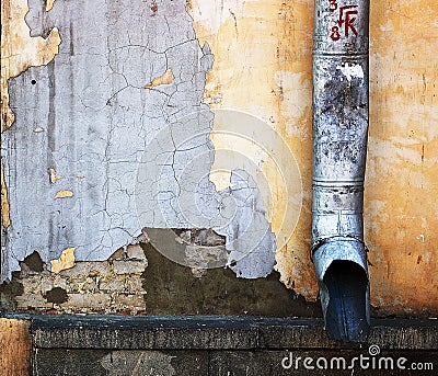 Drainpipe on the wall Stock Photo