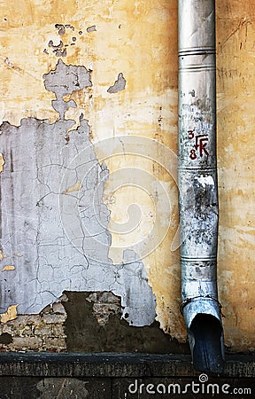 Drainpipe on the wall Stock Photo