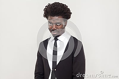 Dramatic afro man cry and looking at camera. Stock Photo