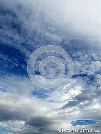 Dramatic blue sky with some grey clouds. Concept of immensity Stock Photo