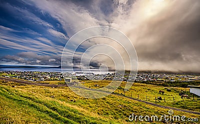 Dramatic change of weather over Torshavn, Faroe Islands, Denmark Stock Photo