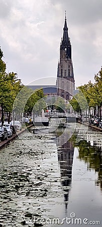 A charming European church with canal vista. Stock Photo