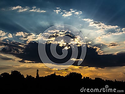 Dramatic cloud against sunset and city silhouette in bottom Stock Photo