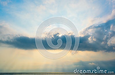 Dramatic Cloud and Sky Before Sunset or After Sunset with Sun Beam. Stock Photo
