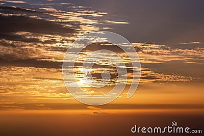 Dramatic Clouds from Above at Sunset or Sunrise Stock Photo