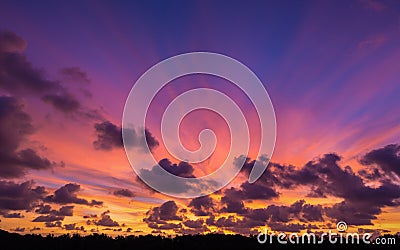 Dramatic colorful twilight sky with floating clouds Stock Photo