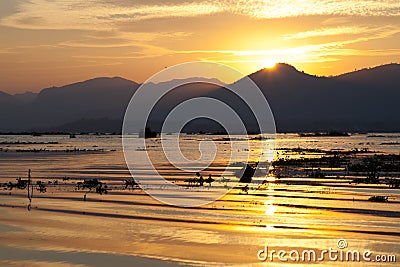 Sunset on Inle Lake Stock Photo