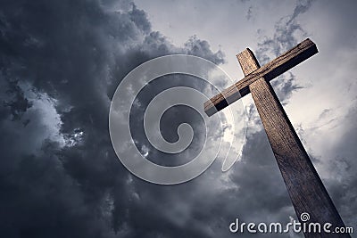 Dramatic cloudscape and wooden cross Stock Photo