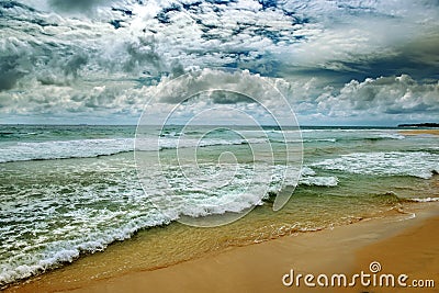 Dramatic dark sky and ocean waves in vintage style. Stock Photo