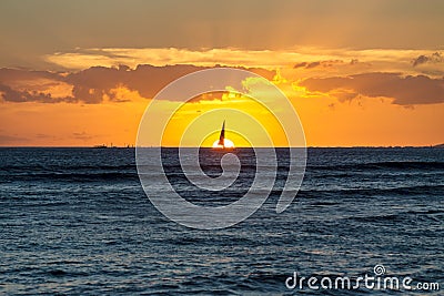 Dramatic fiery orange Hawaiian sunset Stock Photo