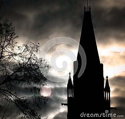 Dramatic Gothic Building, Moonlight and Tree Stock Photo