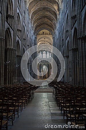 Dramatic interior of cathedral with rows of chairs Editorial Stock Photo