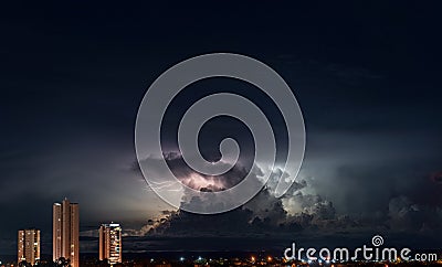 Dramatic Night Sky with Lightning and Urban Skyline Stock Photo