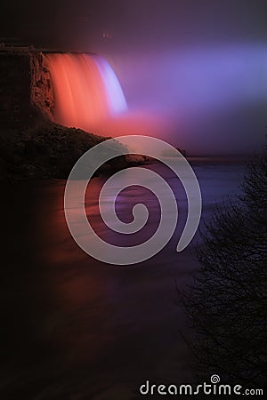 A dramatic nighttime closeup of a section of Niagara Falls and t Stock Photo