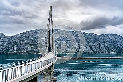 Dramatic photo of Helgelandsbrua norwegian or Helgeland Bridge is Norway`s finest bridges between Alstahaug and Leirfjord at Stock Photo