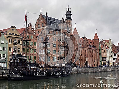 Dramatic picture of the historical buildings of Gdansk on the cold channel Editorial Stock Photo