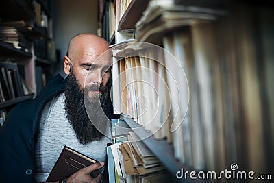 Dramatic portrait of tired bearded hipster man in stress Stock Photo