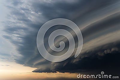 Dramatic rainy sky and dark clouds. Hurricane wind. Strong hurricane over the city. The sky is covered with black storm clouds. Sc Stock Photo